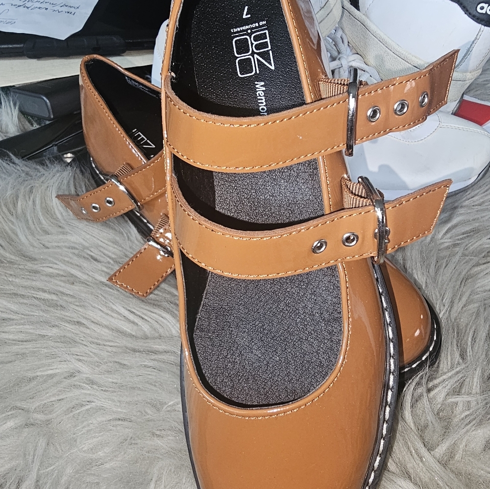 patent leather buckle shoe